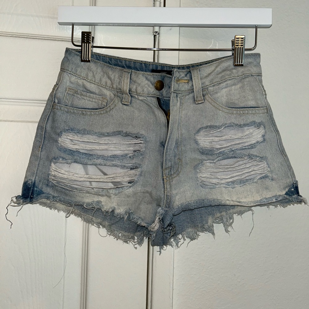 Light blue distressed denim shorts